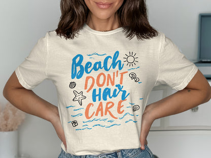 Cream t-shirt with "Beach don't hair care" text and beach graphics.