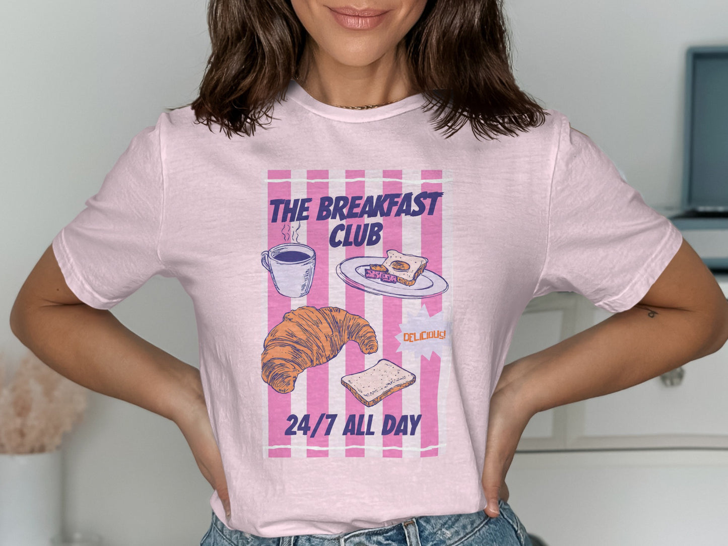 Pink t-shirt with "The Breakfast Club 24/7 All Day" text and breakfast graphics.