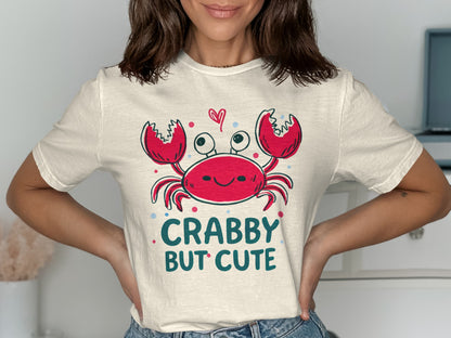 Cream t-shirt with a smiling crab graphic and text "CRABBY BUT CUTE".