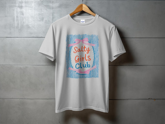 White t-shirt with "Salty Girls Club" text inside an oval ribbon design.