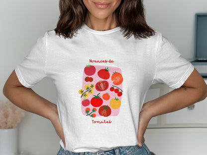 White t-shirt with illustration of assorted tomatoes and "Nuances de Tomates" text.