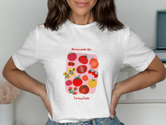 White t-shirt with illustration of assorted tomatoes and "Nuances de Tomates" text.