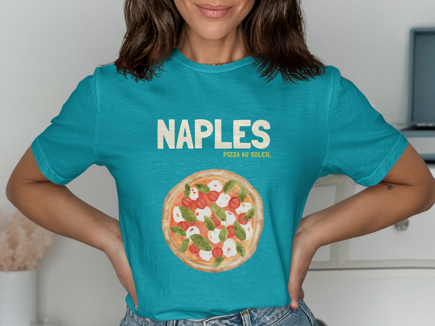 Teal t-shirt with "NAPLES PIZZA AU SOLEIL" and a Margherita pizza graphic.