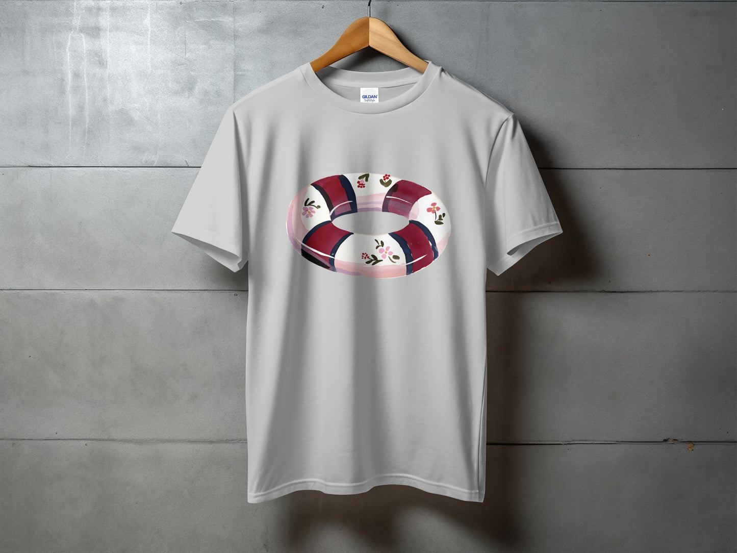 White t-shirt with a watercolor doughnut design.