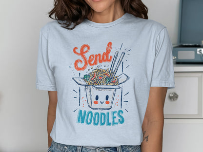 T-shirt with "Send Noodles" text and smiling takeout box graphic.
