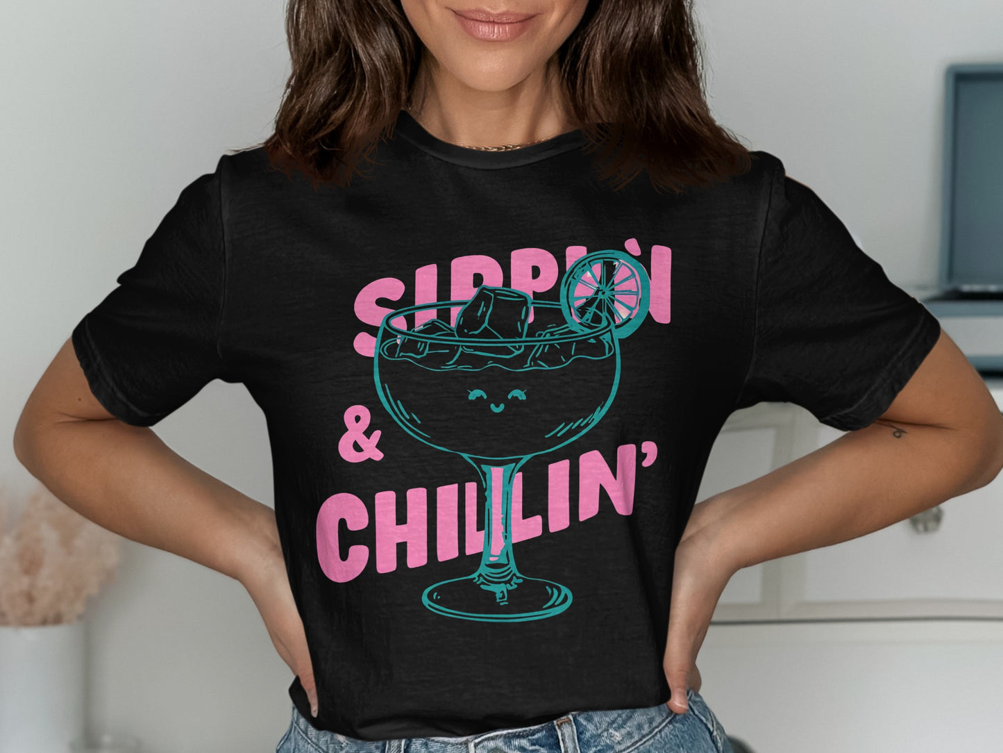 Black t-shirt with "Sippin' & Chillin'" text and a cocktail graphic.