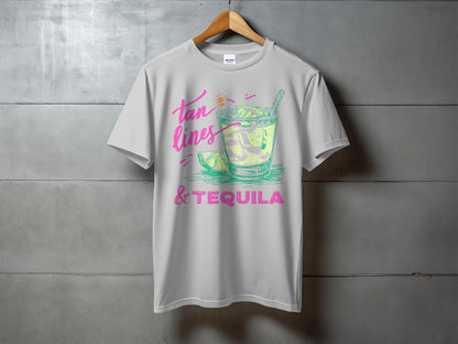 White t-shirt with "tan lines & tequila" and a colorful margarita illustration.