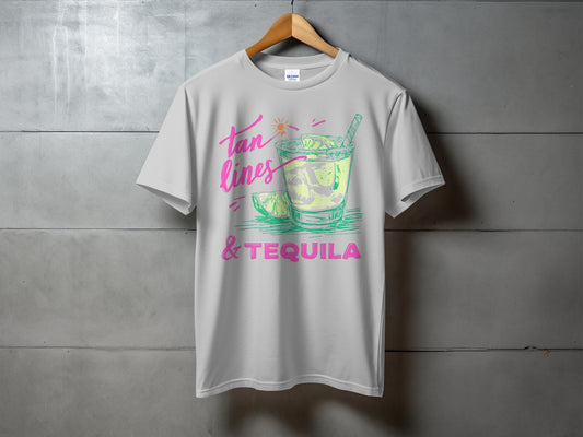 White t-shirt with "tan lines & tequila" and a colorful margarita illustration.