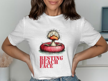 White t-shirt with cartoon duck in a float and text "RESTING BEACH FACE".