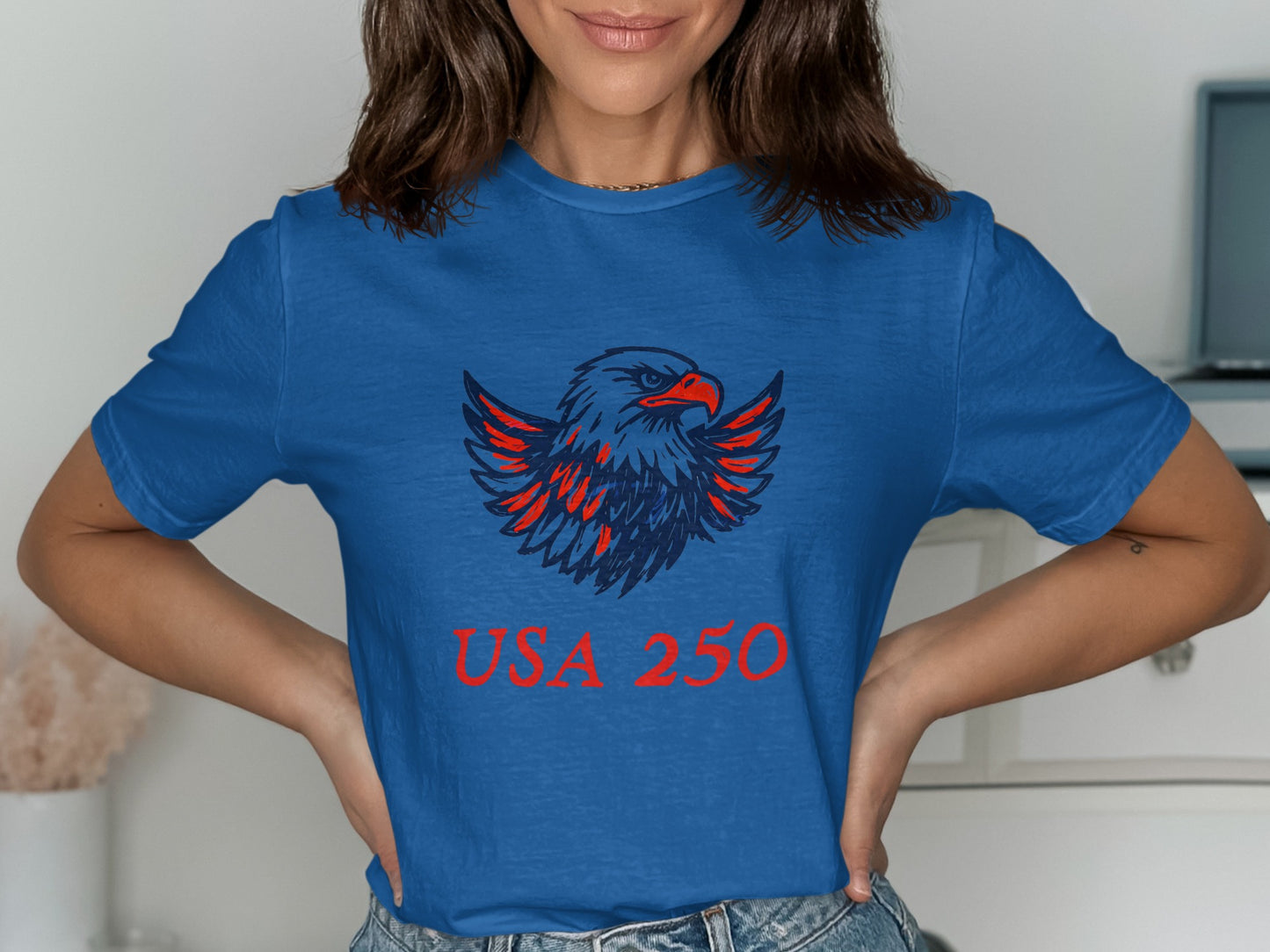Blue t-shirt with red eagle graphic and "USA 250" text.