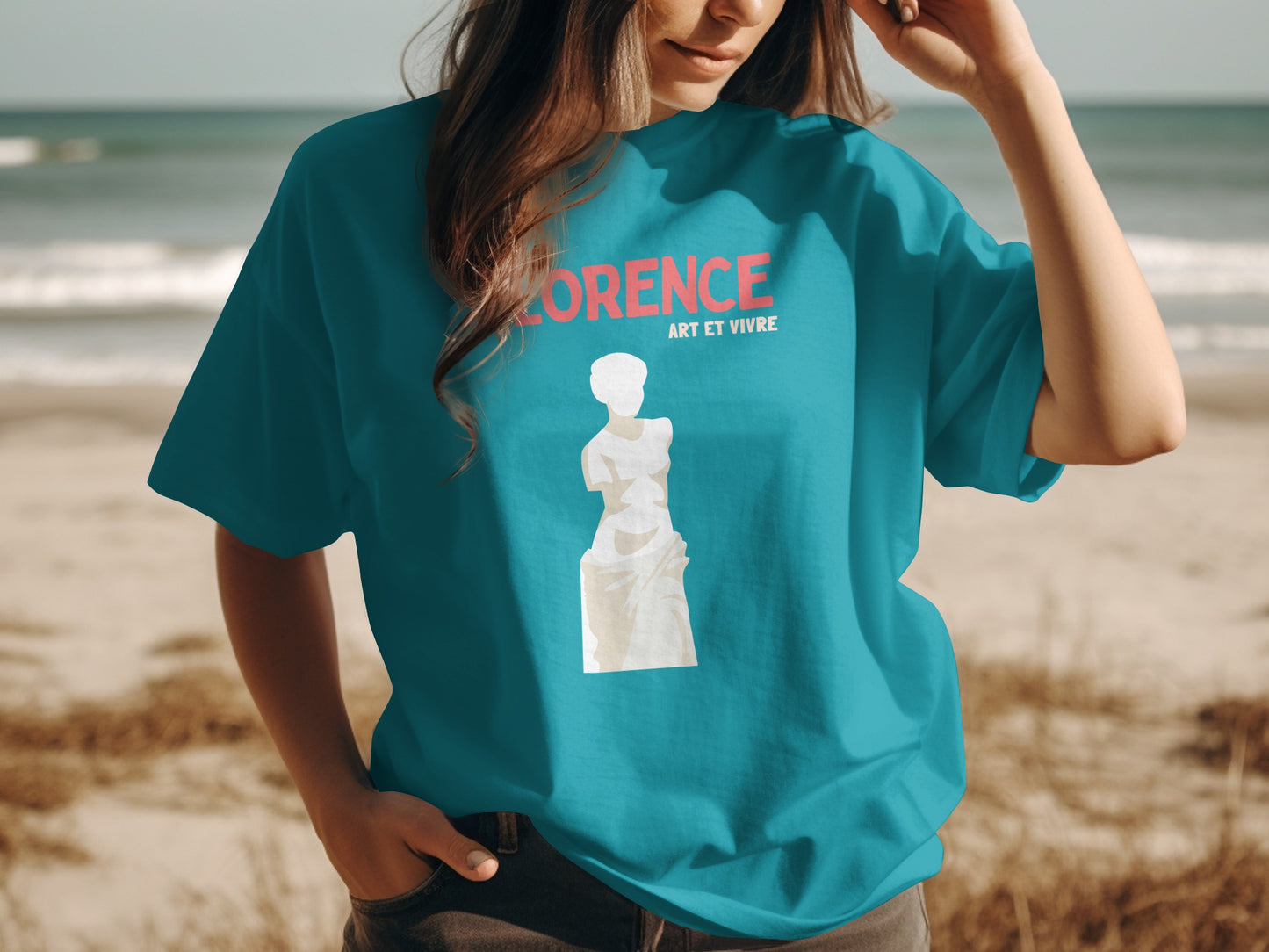 Teal t-shirt with Florence art and living graphic and statue.