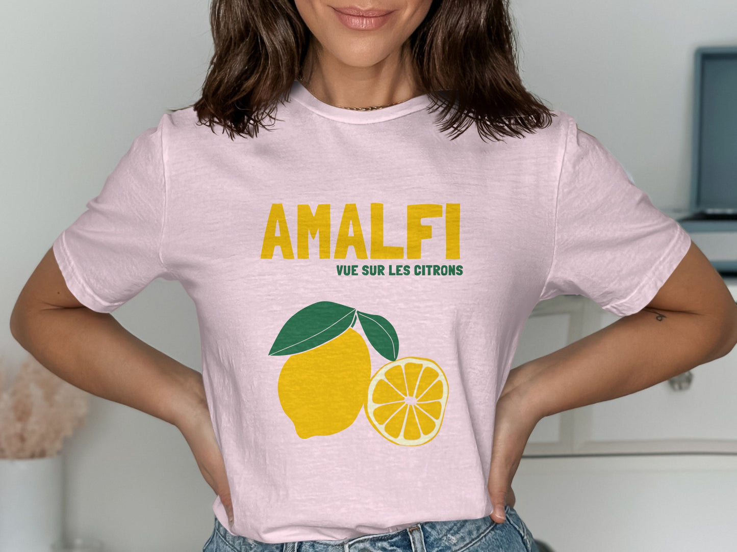 Pink t-shirt with "AMALFI" and lemon graphic.