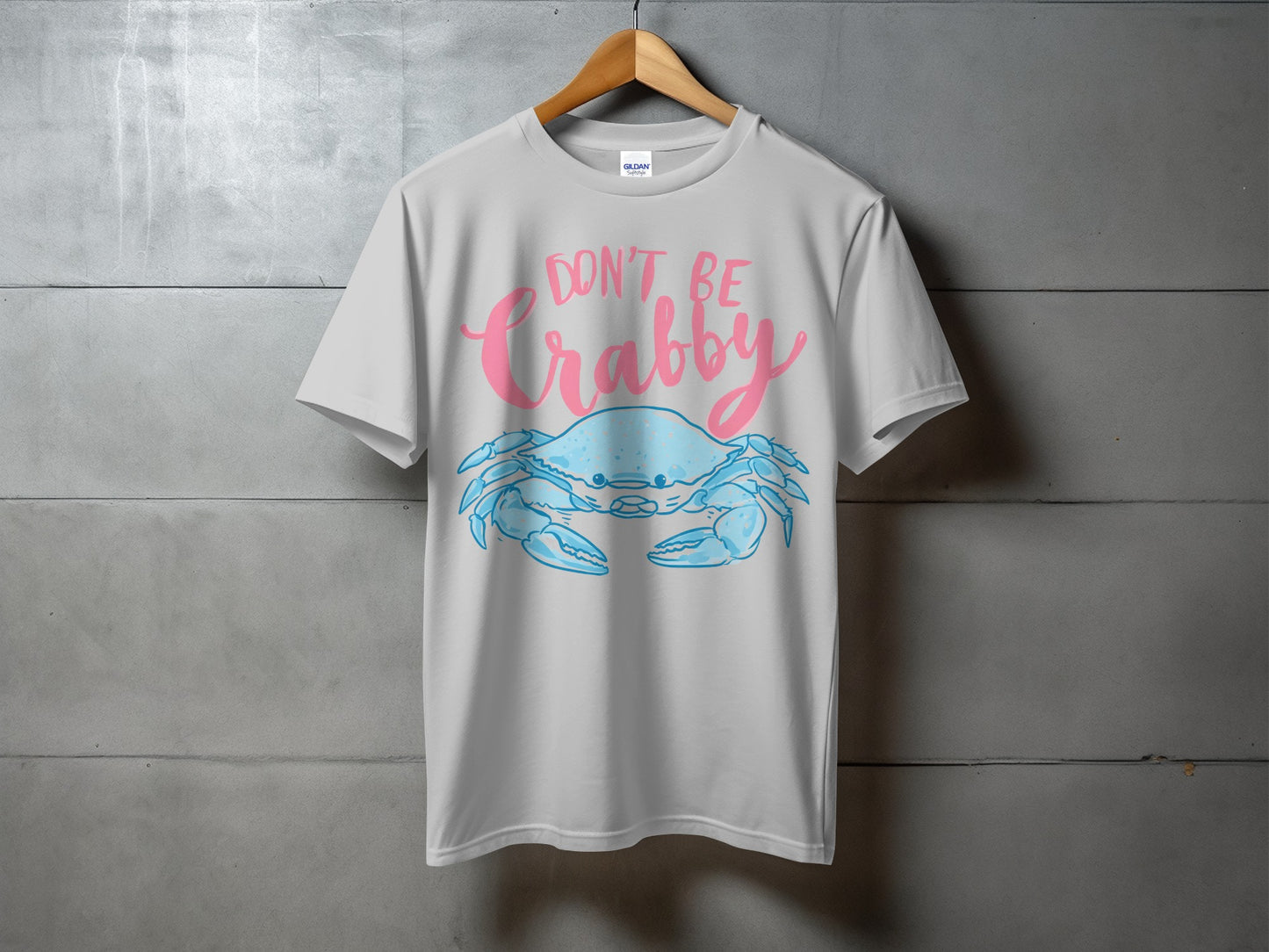 Light grey t-shirt with a blue crab and "Don't Be Crabby" text.