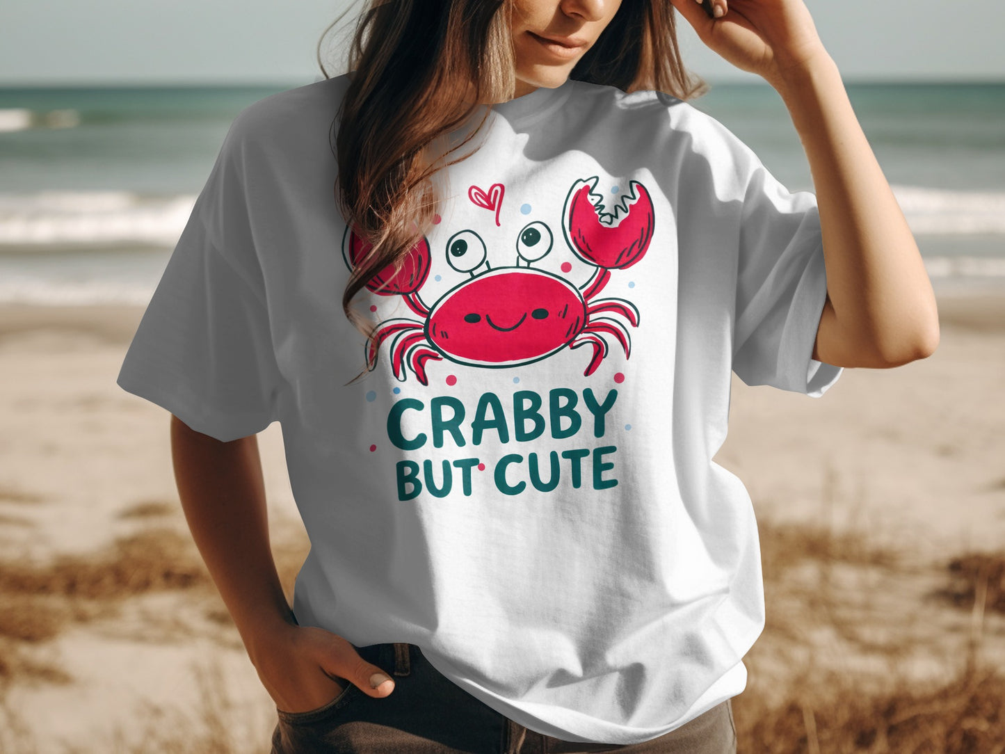 White t-shirt with cartoon crab and text "CRABBY BUT CUTE".