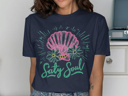Navy t-shirt with pink seashell, flowers, and "Salty Soul" text.