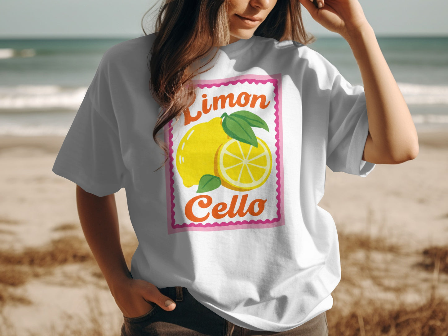 White t-shirt with "Limon Cello" text and a cartoon lemon illustration.