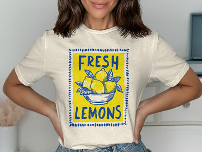 Cream t-shirt with "Fresh Lemons" text and a bowl of lemons design.