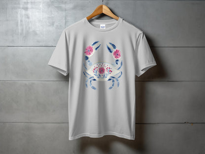 Grey t-shirt with a blue crab and pink floral design.