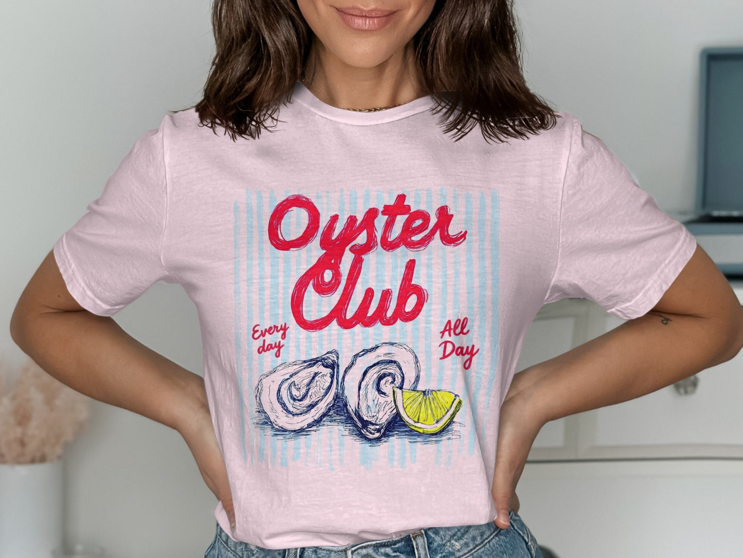 Pink t-shirt with "Oyster Club" graphic and two oysters.