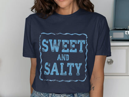 Navy blue t-shirt with "SWEET AND SALTY" text in distressed blue font.