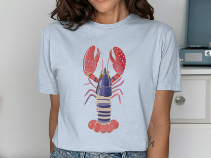 Light blue t-shirt with a red and blue lobster graphic.