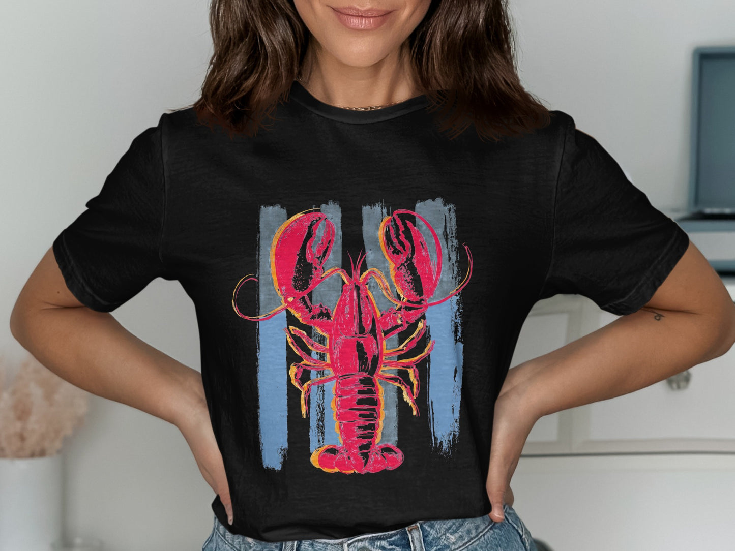 Black t-shirt with a distressed red lobster design on blue and gray stripes.