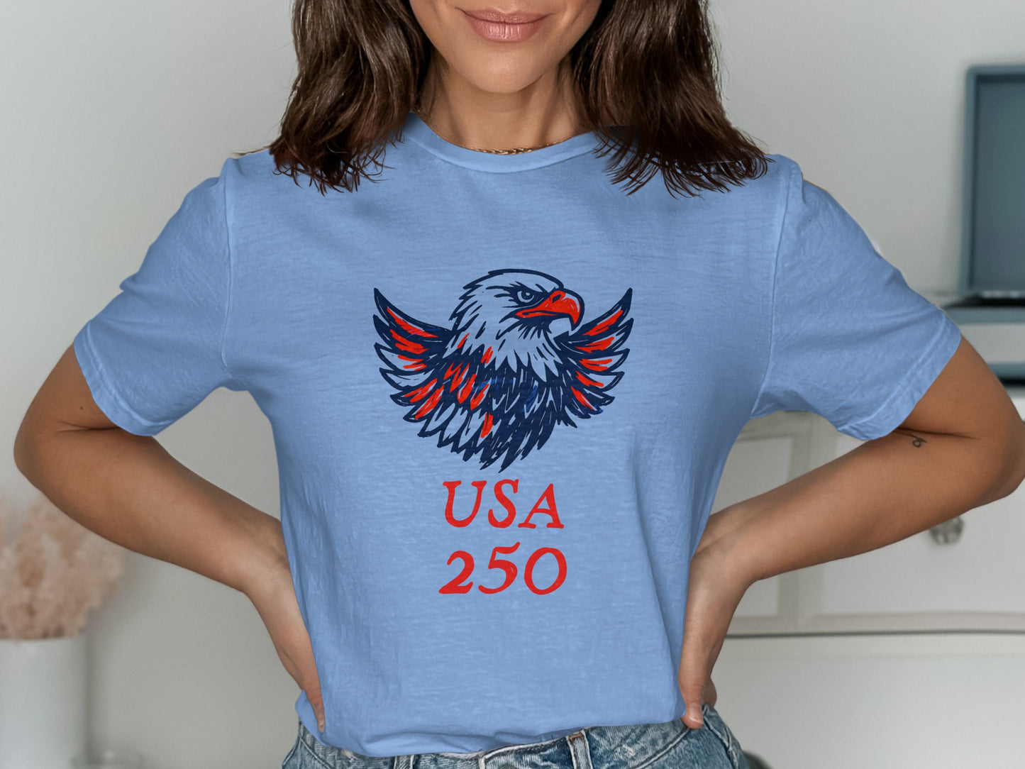 Light blue t-shirt with a bald eagle and "USA 250" text.