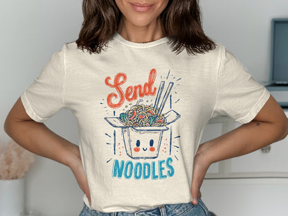Cream t-shirt with "Send Noodles" text and illustration of an open takeout box with noodles.