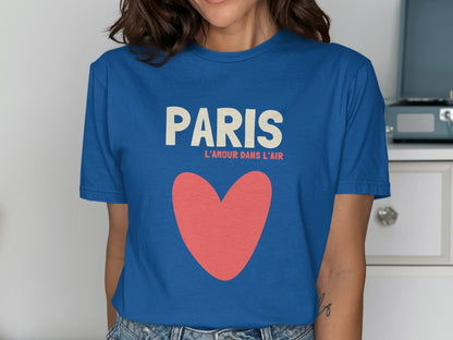 Blue t-shirt with "PARIS L'AMOUR DANS L'AIR" text and a large red heart.
