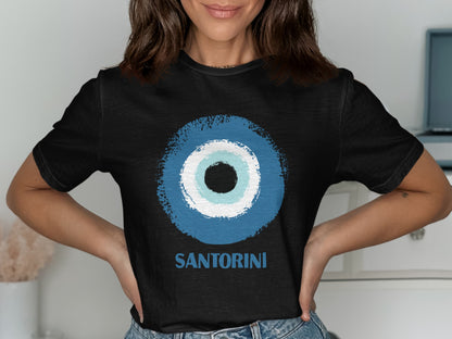 Black t-shirt with a blue and white evil eye graphic and "SANTORINI" text.