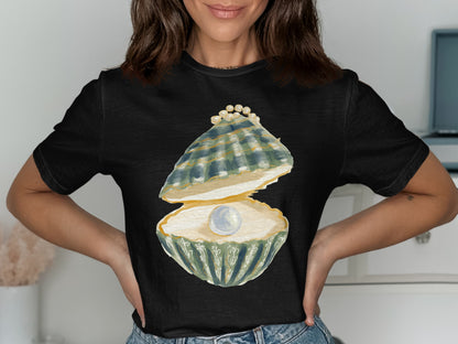 Black t-shirt with an open oyster revealing a pearl and surrounding smaller pearls.