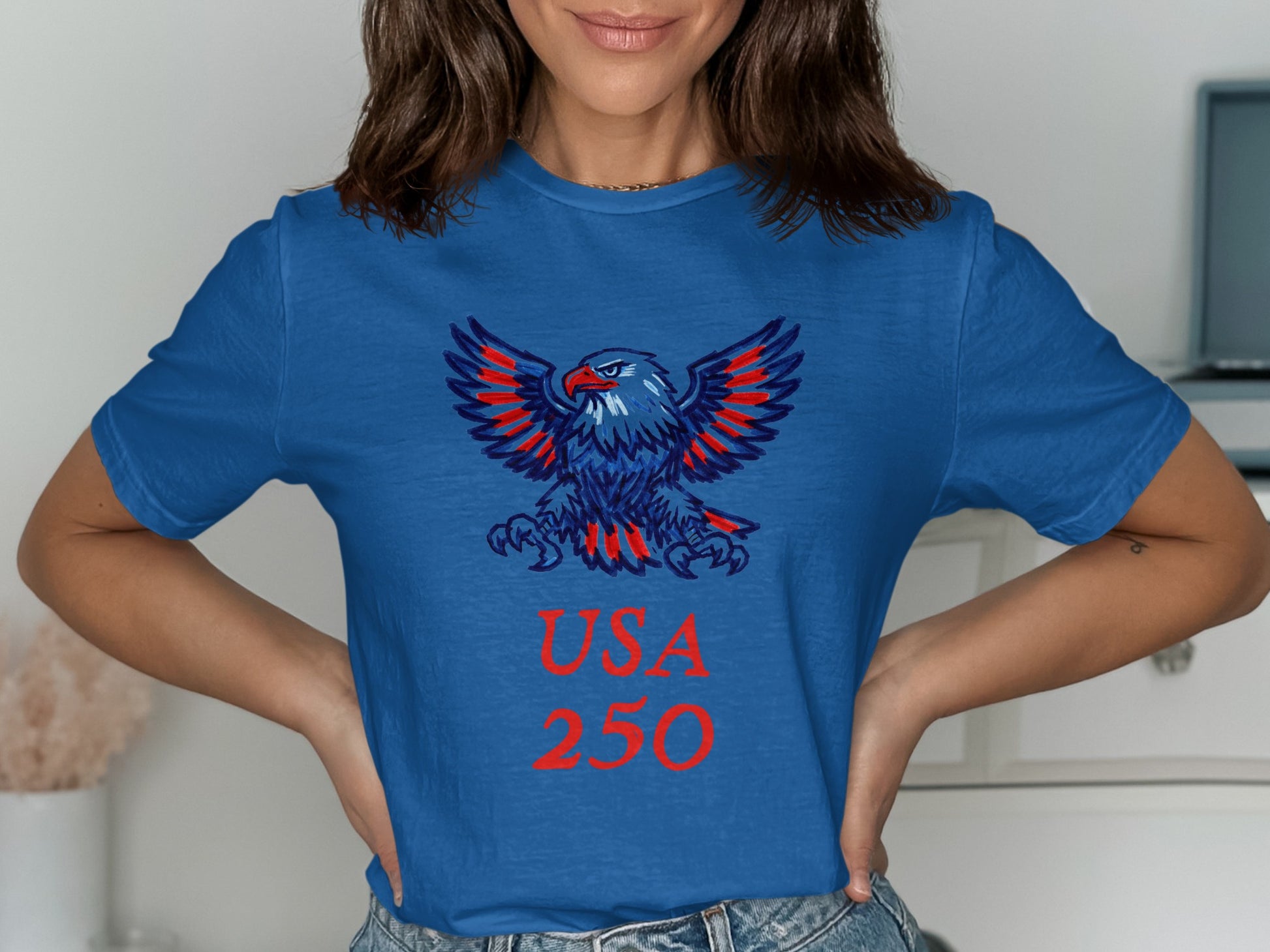 Blue t-shirt with red eagle and "USA 250" text.