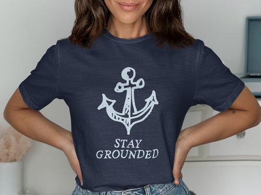 Navy t-shirt with white anchor graphic and "STAY GROUNDED" text.