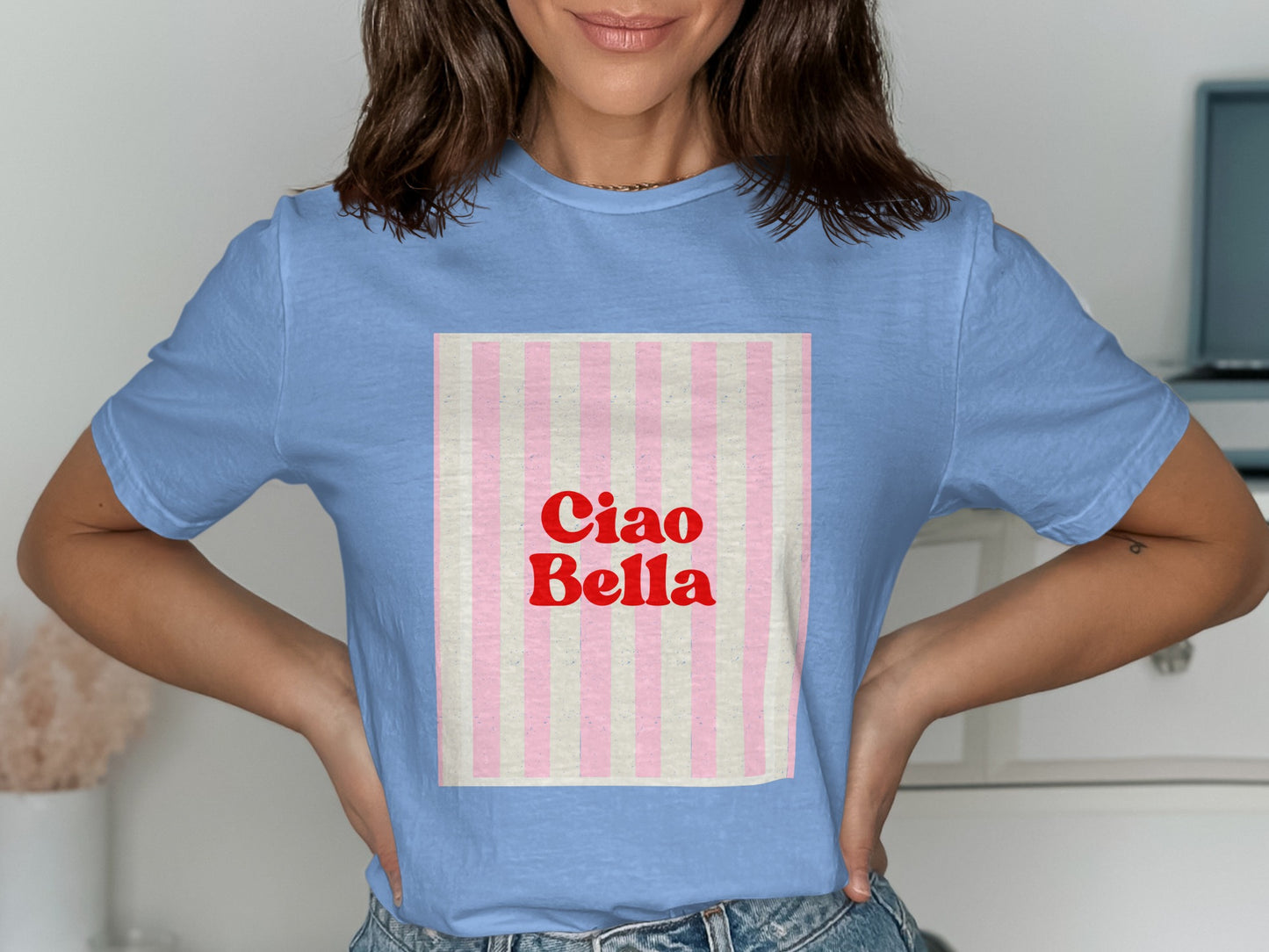 Light blue t-shirt with pink and white vertical stripes and "Ciao Bella" text.