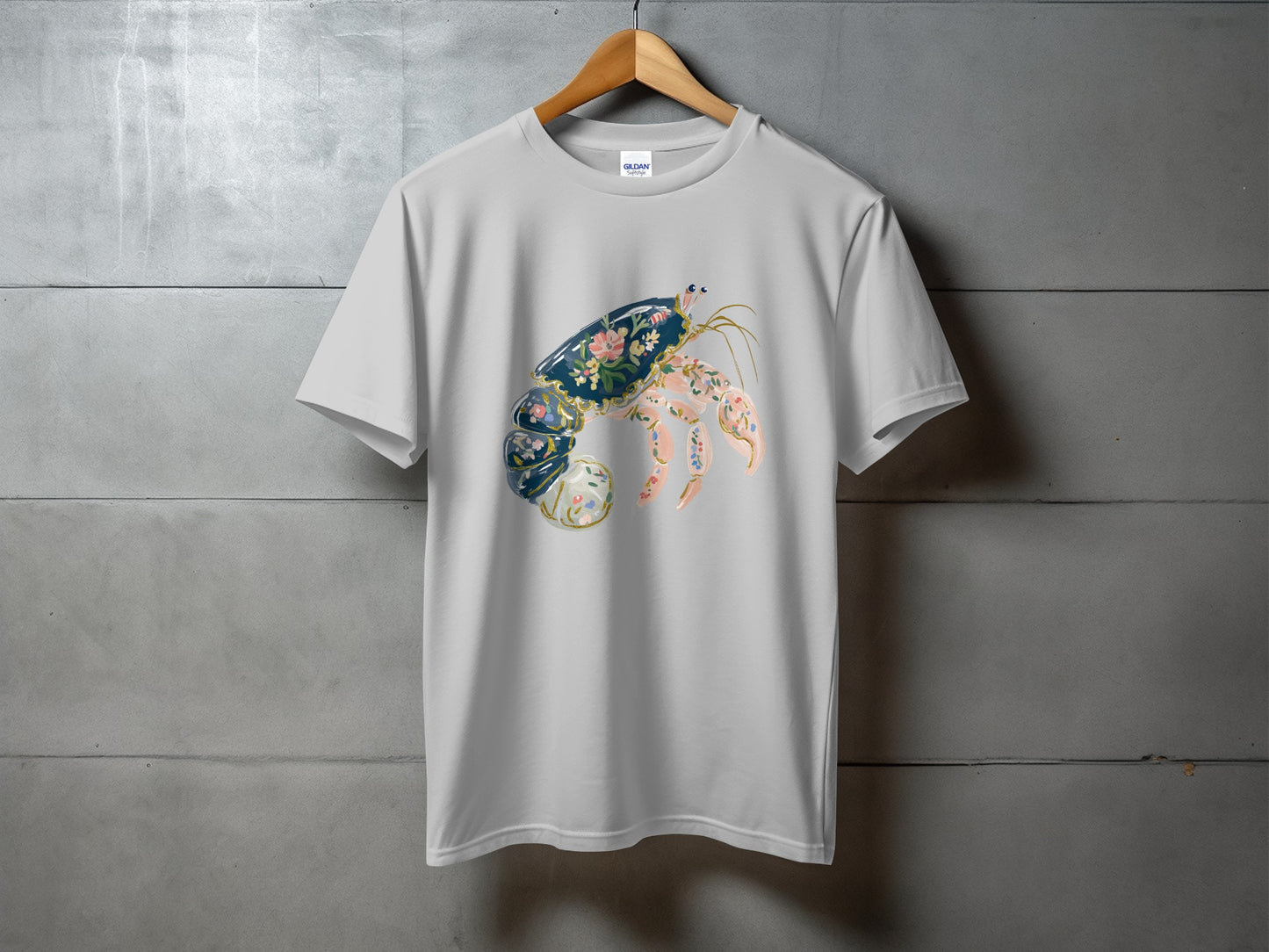 Gray t-shirt with a large colorful hermit crab design.