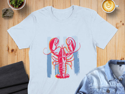 Light blue t-shirt with a red and blue abstract lobster graphic.