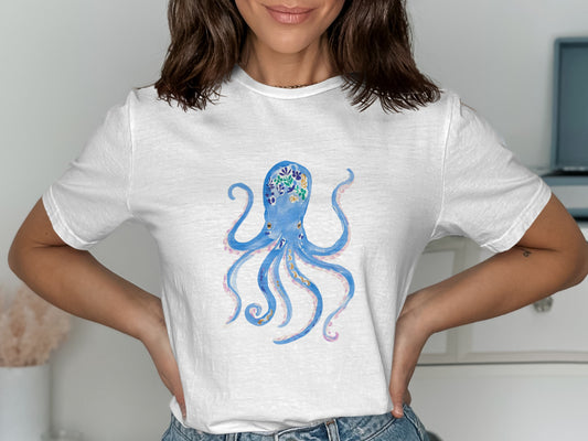 White t-shirt with blue watercolor octopus and floral pattern.