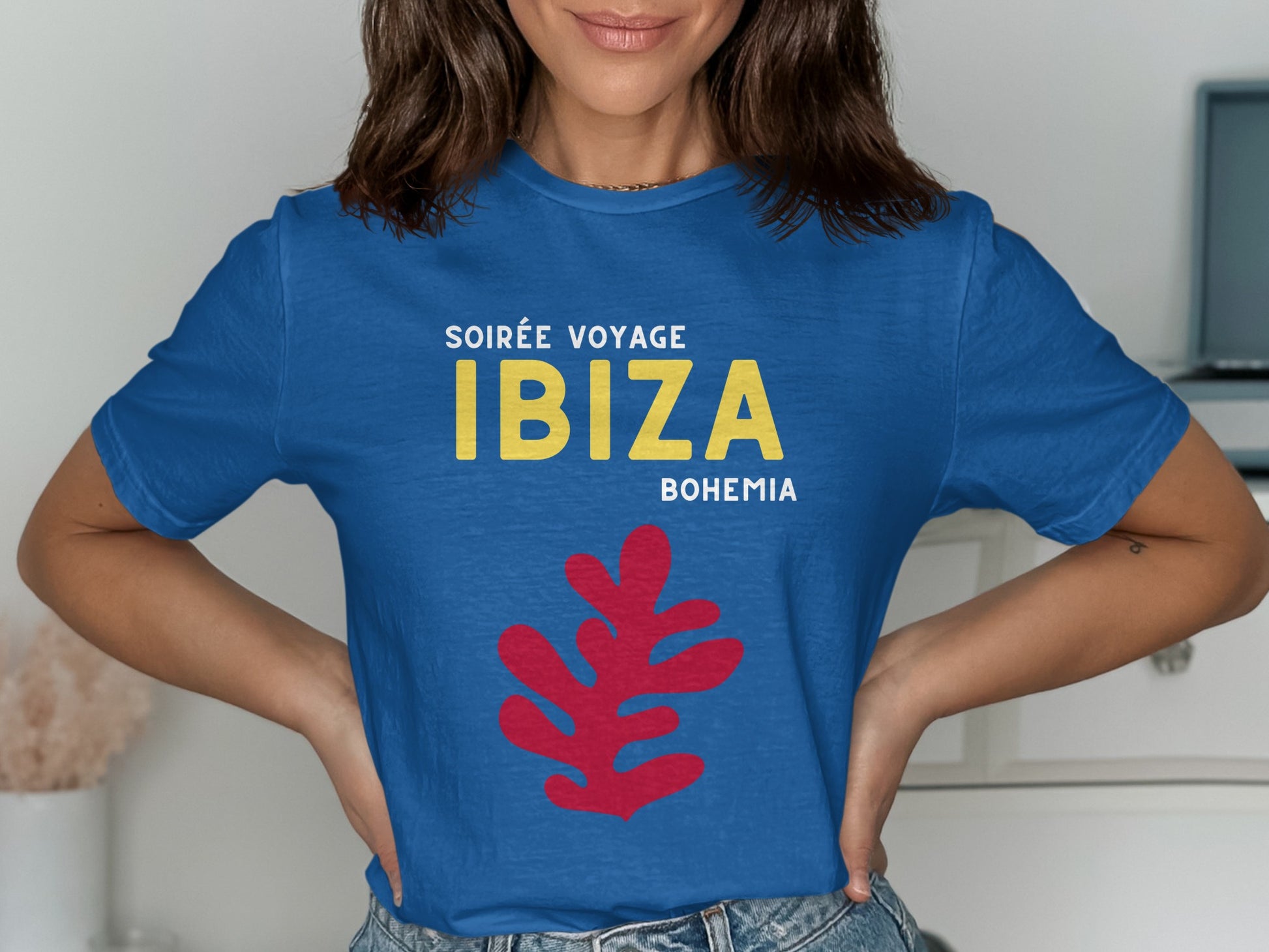 Blue t-shirt with "IBIZA" and red leaf graphic.