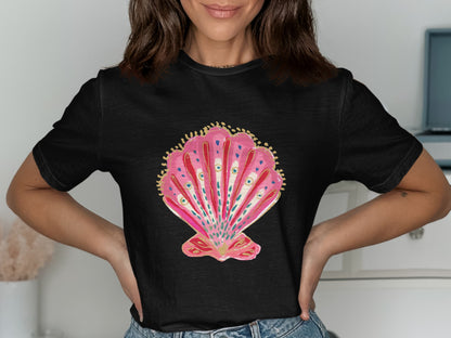 Black t-shirt with a pink seashell graphic featuring gold and blue accents.