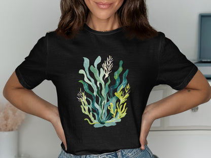 Black t-shirt featuring a watercolor illustration of green and yellow seaweed.