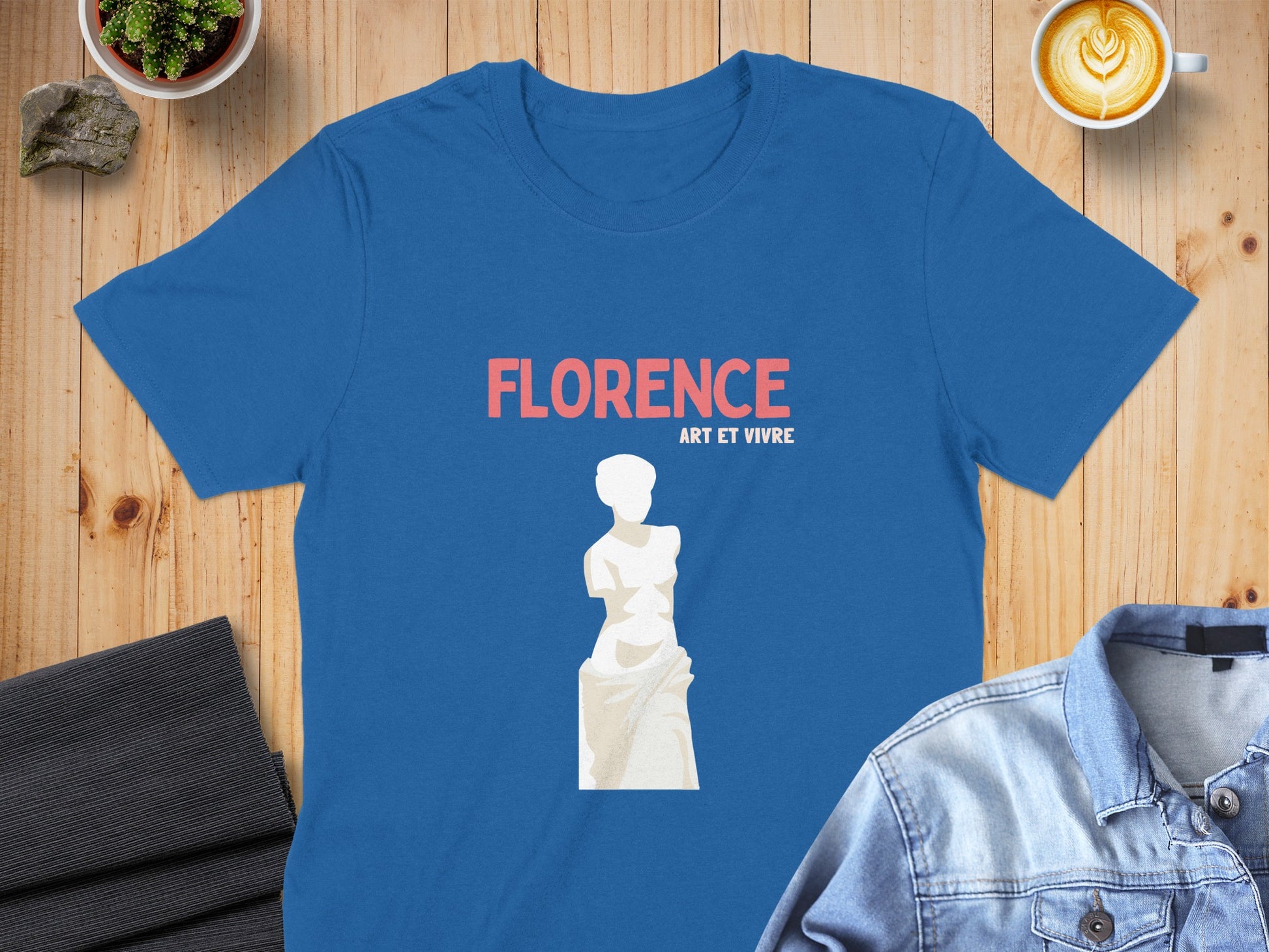 Blue t-shirt with a stylized statue and "FLORENCE ART ET VIVRE" text.