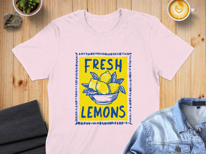 Pink t-shirt with "FRESH LEMONS" in yellow text and lemon illustration.