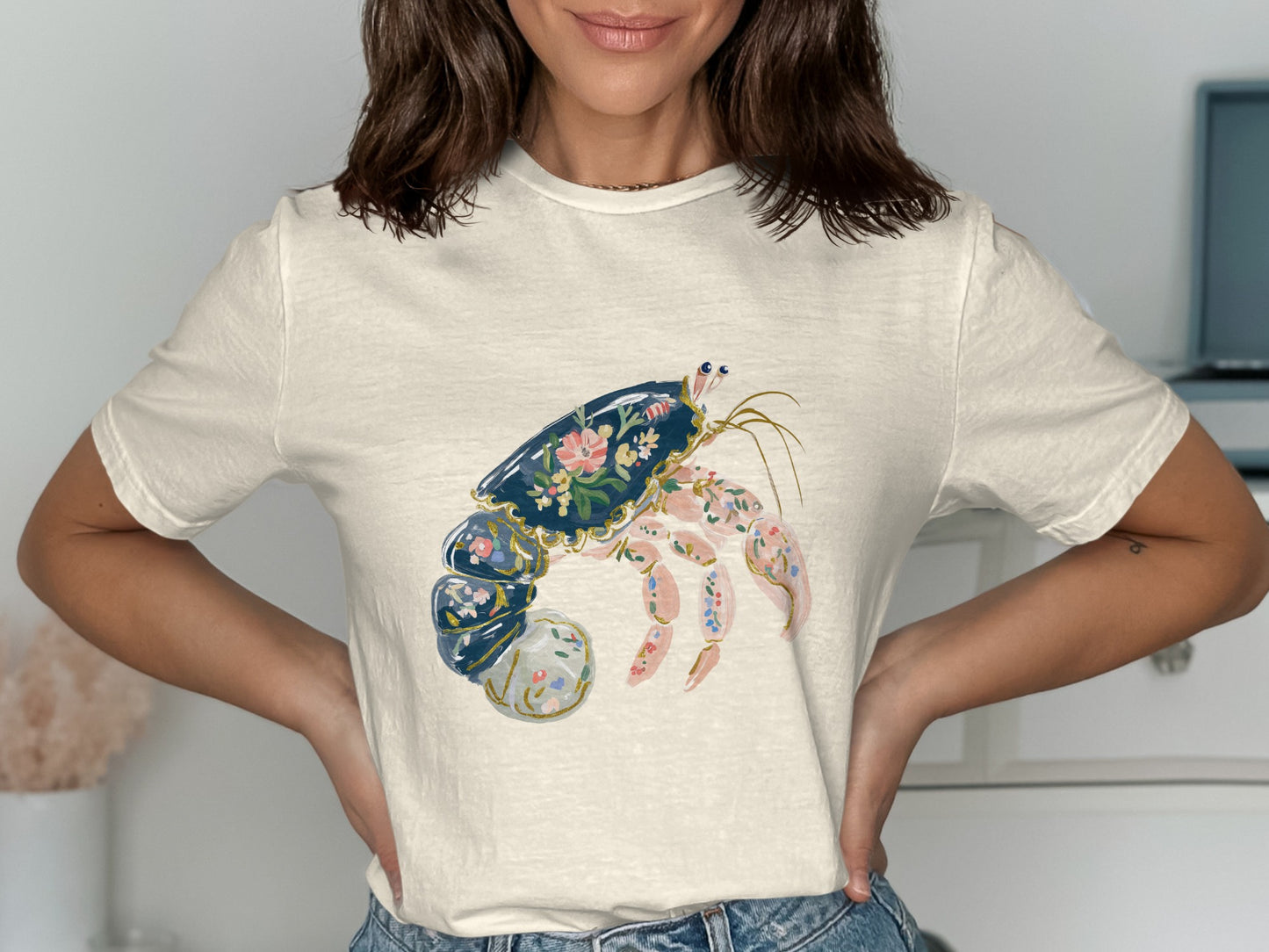 Cream t-shirt with a floral painted lobster design.
