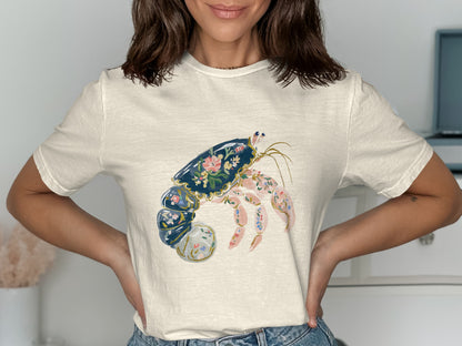 Cream t-shirt with a floral painted lobster design.