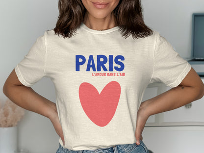 Cream t-shirt with "PARIS L'AMOUR DANS L'AIR" and a red heart.