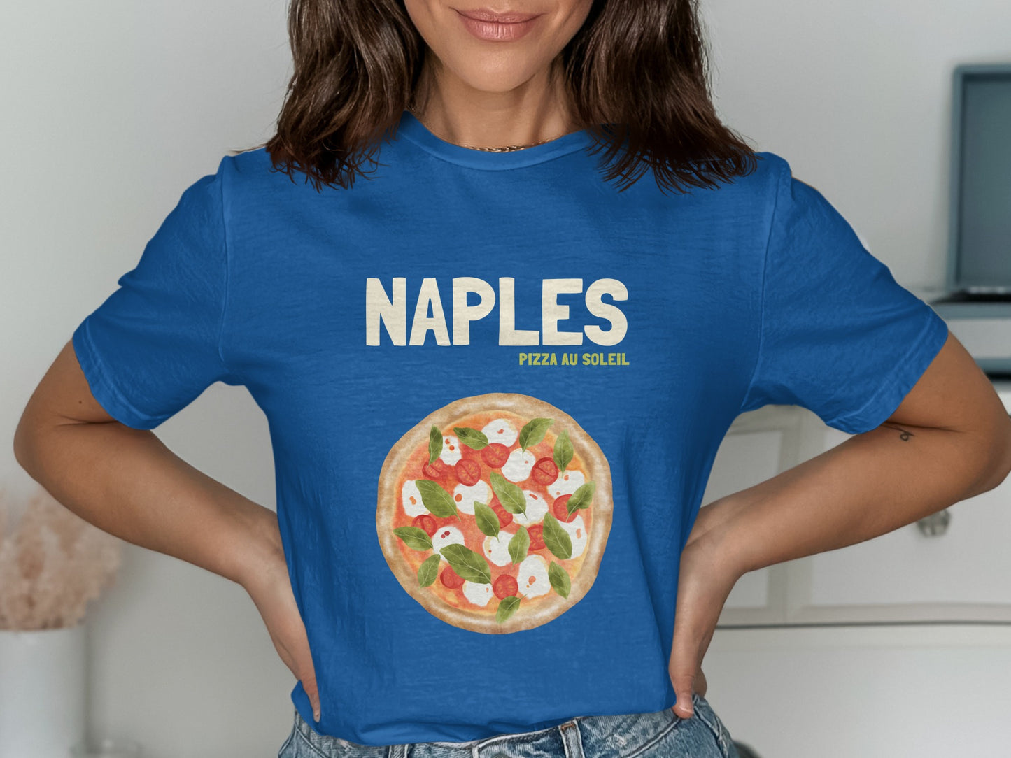 Blue t-shirt with "Naples Pizza Au Soleil" text and a pizza graphic.
