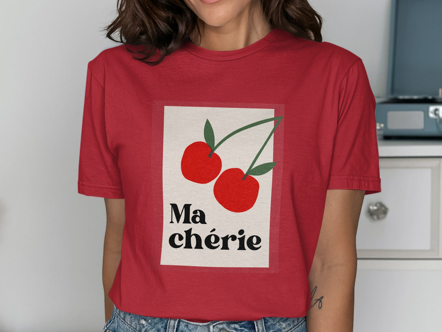 Red t-shirt with two cherries and "Ma chérie" text.