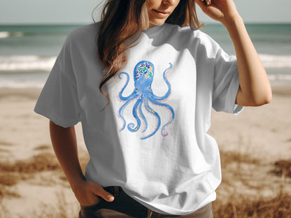 White t-shirt with blue watercolor octopus graphic on chest.