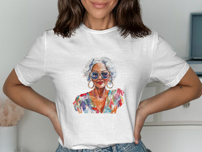 Woman wearing white t-shirt with colorful portrait of stylish older woman.