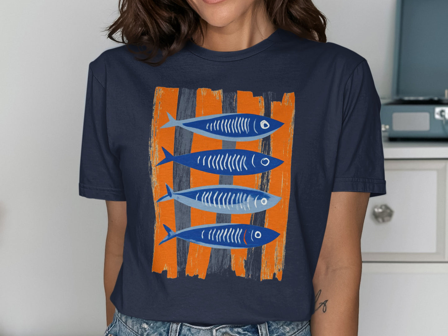 Four blue fish with white stripes on striped orange and navy background.